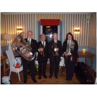 A Brass Quartet (Alf conducting from 1st Trumpet, Trina on Trumpet and Flugelhorn, Becky on Trombone and Tony on Tuba) After playing for a Christmas 
		Dinner at the Titchwell Manor Hotel 16th December, 2010